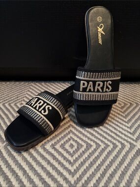 Aris Black Slide Sandals with White 'PARIS' Embroidery